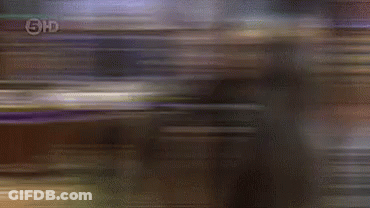 Group Playing In Living Room With BB Sign GIF
