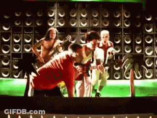 Group Playing Instruments On Stage GIF