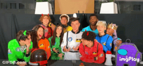 Group Posing By Purple Among Us Bag GIF