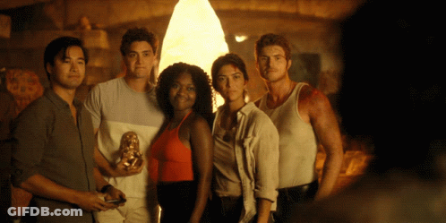 Group Posing For Picture In Front Of Light GIF