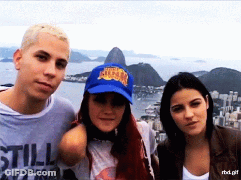 Group Posing For Picture With Blue NBA Hat GIF