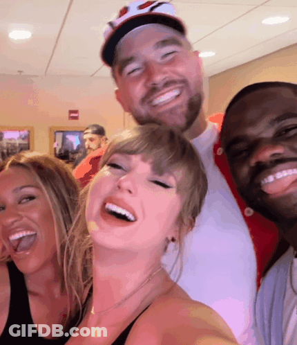 Group Posing With Chicago Bulls Hat GIF