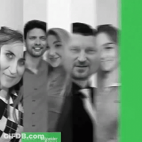 Group Posing With Life Is On Schneider Sign GIF