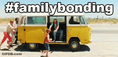 Group Pushing Yellow Van With Family Bonding GIF
