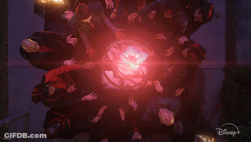 Group Putting Hands Together With Disney Plus Logo GIF