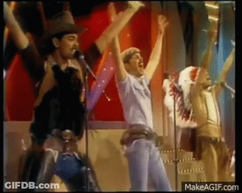 Group Raising Arms With YMCA GIF