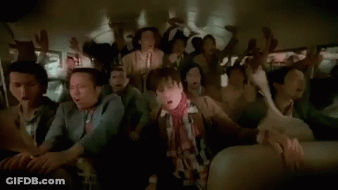 Group Riding Bus With Hands Up GIF
