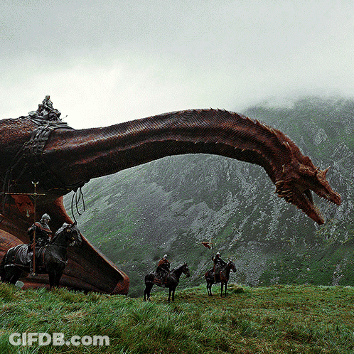 Group Riding Horses In Front Of Red Dragon GIF