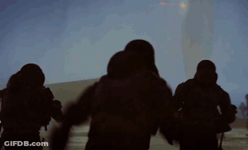 Group Running In Foggy Area With Sun GIF
