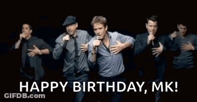 Group Singing Into Microphones On Stage GIF