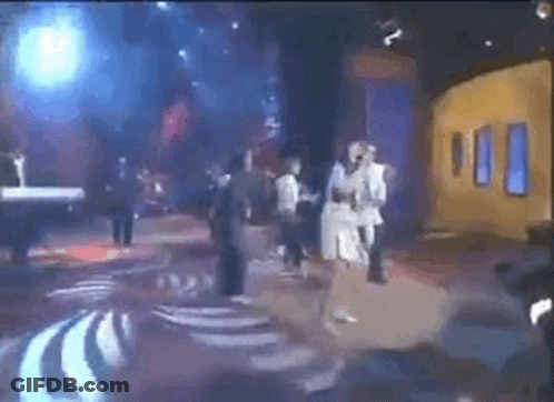 Group Singing On Stage With Piano GIF