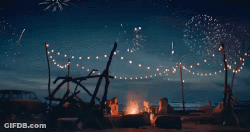 Group Sitting Around Campfire Buon Ferragosto GIF