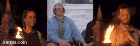 Group Sitting Around Fire With UC Shirt GIF