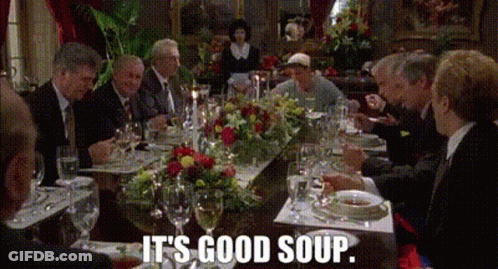 Group Sitting Around Table Saying It's Good Soup GIF