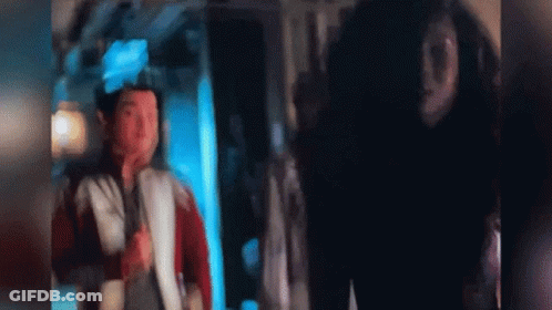 Group Sitting Around Table Someone Sticking Out Tongue GIF