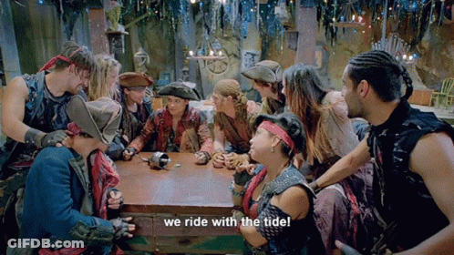Group Sitting Around Table We Ride With The Tide GIF