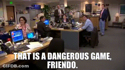 Group Sitting At Desks Saying That Is A Dangerous Game Friend GIF