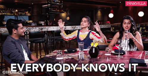 Group Sitting At Table Saying Everybody Knows It GIF