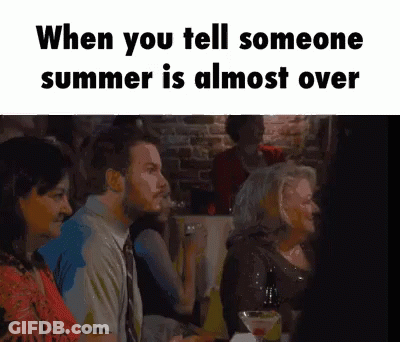 Group Sitting At Table Saying When You Tell Someone Summer Is Almost Over GIF