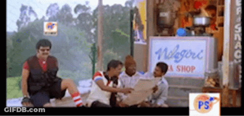 Group Sitting Before Niagara Tea Shop Sign GIF