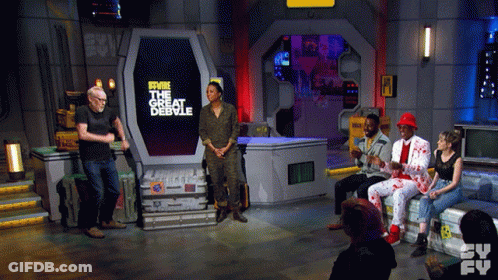 Group Sitting Before Sign Saying The Great Debhole GIF