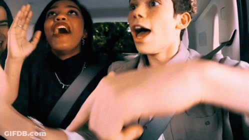Group Sitting In Back Seat With Hands Up GIF