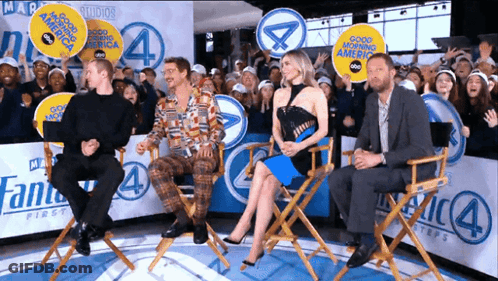 Group Sitting In Front Of Good Morning America Sign GIF