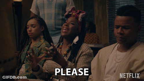 Group Sitting In Front Of Please Sign GIF