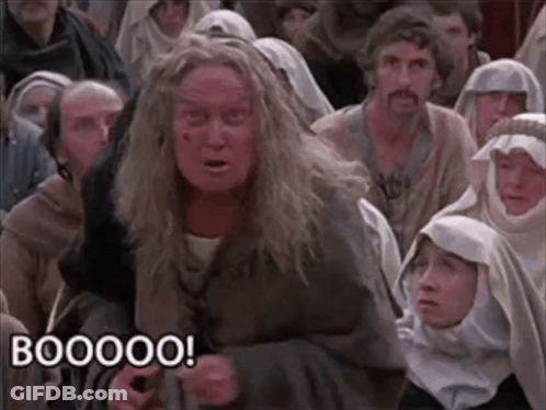 Group Sitting In Room One Making Funny Face Saying Booooo GIF