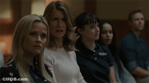 Group Sitting In Room With Amanda Shirt GIF