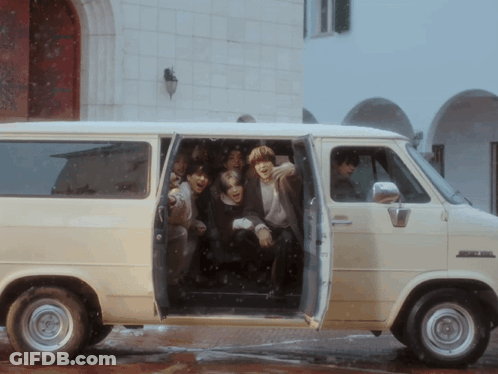 Group Sitting In Van With Doors Open GIF
