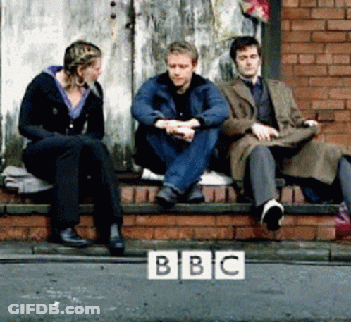 Group Sitting On Brick Wall With BBC Logo GIF