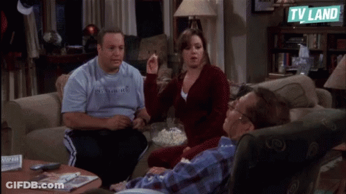 Group Sitting On Couch With TV Land Sign GIF