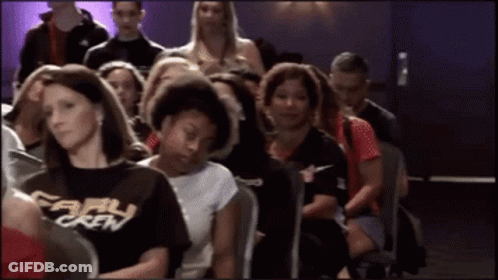 Group Sitting, One Wearing Early Crew Shirt GIF