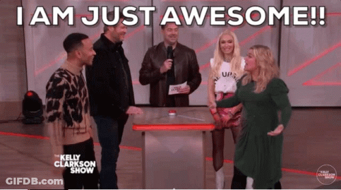 Group Standing Around Table Saying I Am Just Awesome GIF