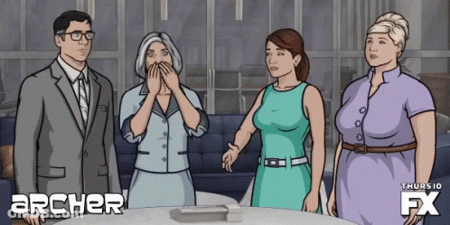 Group Standing Around Table With Archer GIF