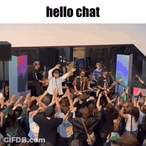 Group Standing Before Stage Saying Hello Chat GIF