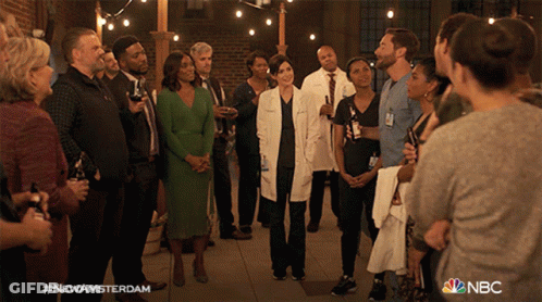 Group Standing In Circle #NewAmsterdam GIF