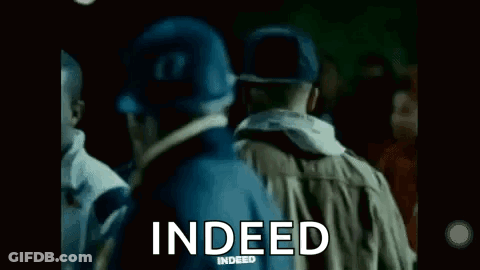 Group Standing In Dark Room With Indeed GIF
