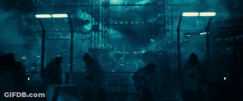 Group Standing In Front Of Coca Cola Sign GIF