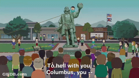Group Standing In Front Of Columbus Statue GIF