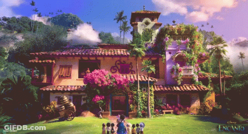 Group Standing In Front Of Encanto House GIF