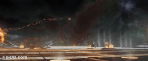 Group Standing In Front Of Giant Monster In Dark Room GIF