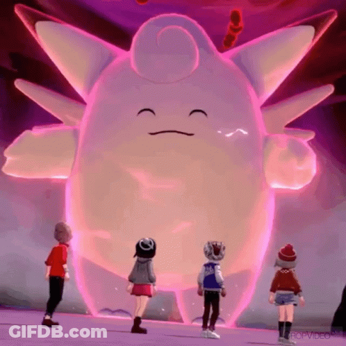 Group Standing In Front Of Giant Pink Monster Says Cropvideo GIF