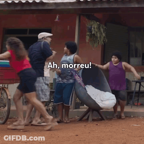 Group Standing In Front Of House Ah Morreu GIF
