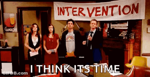 Group Standing In Front Of Intervention Banner GIF