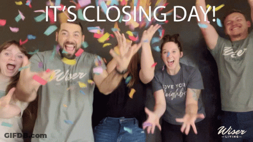 Group Standing In Front Of It's Closing Day Sign GIF