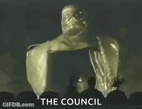 Group Standing In Front Of Join Us The Council Sign GIF