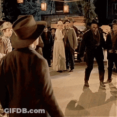 Group Standing In Front Of Molly Building GIF