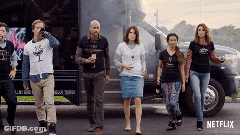 Group Standing In Front Of Netflix Truck GIF